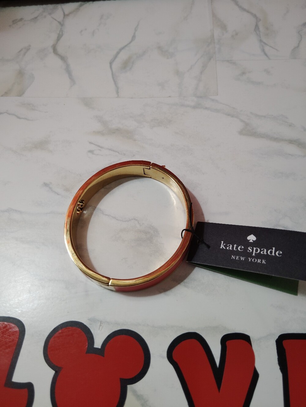 kate spade Coral and Gold Hinged Bangle Bracelet